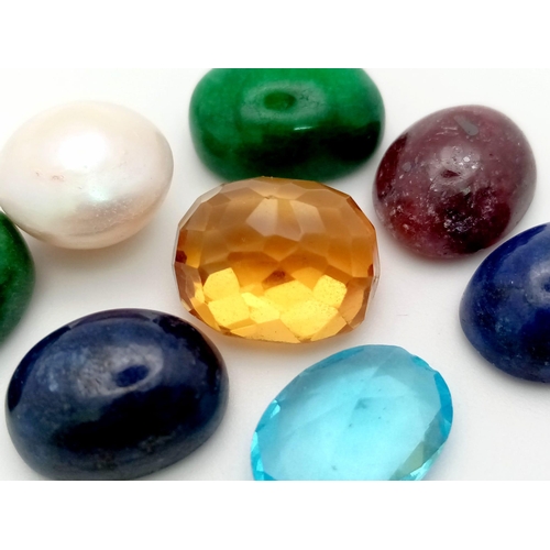 1128 - A 96.80ct of 9pcs of Natural Multi Stones, to include: Faceted Citrine, Blue Topaz, Cabochon Emerald... 