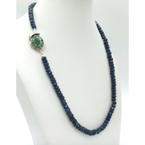 1293 - A 925 Silver, 202ct Faceted Blue Sapphire Single Strand Necklace with Emerald Clasp. 48cm.