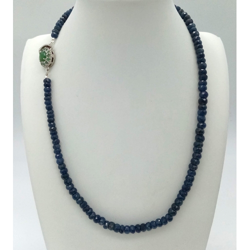 1293 - A 925 Silver, 202ct Faceted Blue Sapphire Single Strand Necklace with Emerald Clasp. 48cm.