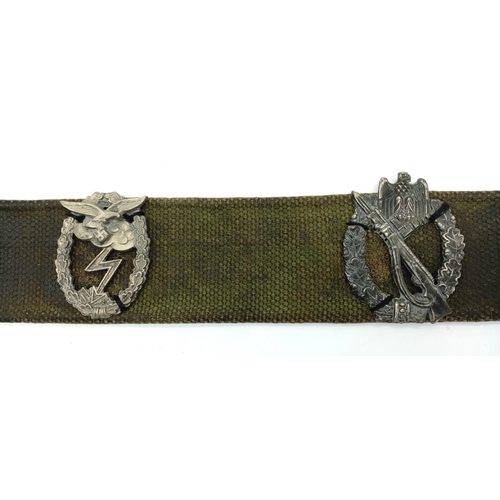 172 - WW2 British Belt with German Badges.