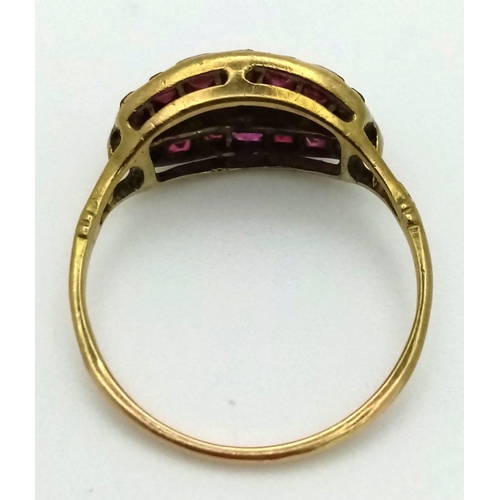 540 - A Fine Quality Antique Ruby and Diamond Ring. Diamonds surrounded by fine calibrated rubies. Set in ... 