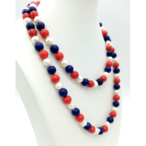 888 - A Lapis Lazuli, Red Coral and Freshwater Pearl Matinee Length Necklace. 82cm. 8mm beads. Pearls - 6/... 