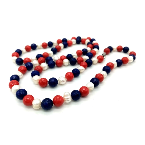 888 - A Lapis Lazuli, Red Coral and Freshwater Pearl Matinee Length Necklace. 82cm. 8mm beads. Pearls - 6/... 