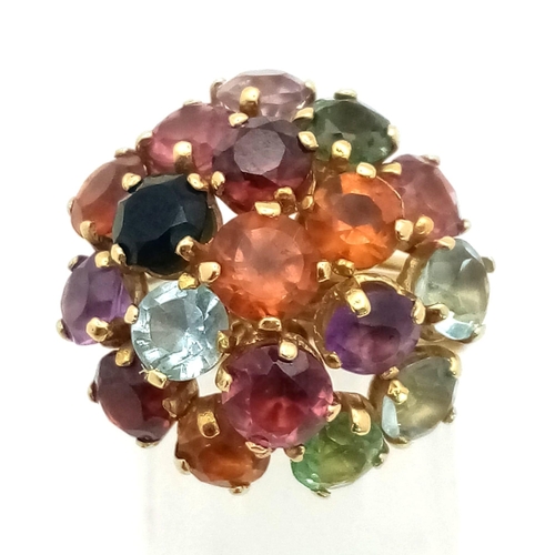 284 - 18k yellow gold multi stone set ring. 4mm stones, Total Weight 6.3g, size M