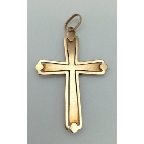 381 - 9k yellow gold crucifix pendant. Weighs 3.2g.  (H:4.5cm)