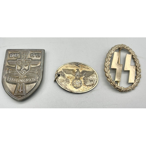 384 - 5 x Reproduction Nazi Badges.