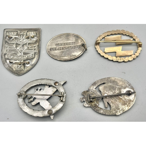 384 - 5 x Reproduction Nazi Badges.