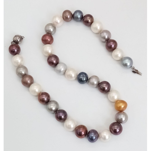 695 - A Large Tahitian Pearl (14mm) Necklace - White, black and gold amongst the colours. 38cm