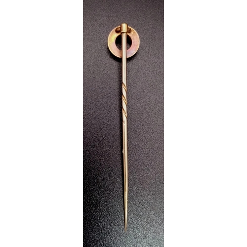 702 - A High-Karat Gold (tested) Antique Onyx Bullseye and Pearl Screw Top Stickpin. 5cm