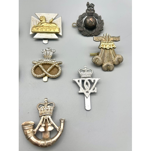 778 - 10 x Metal British Army Cap Badges from the Reign of Queen Elizabeth II.