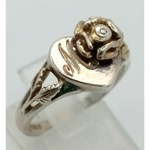 959 - A 925 Silver fully Hallmarked Heart and Flower Design Signet Ring. Total Weight 4.05g. Size Q.