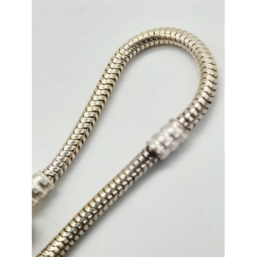 1161 - A sterling silver, designer style, snake chain bracelet with a 