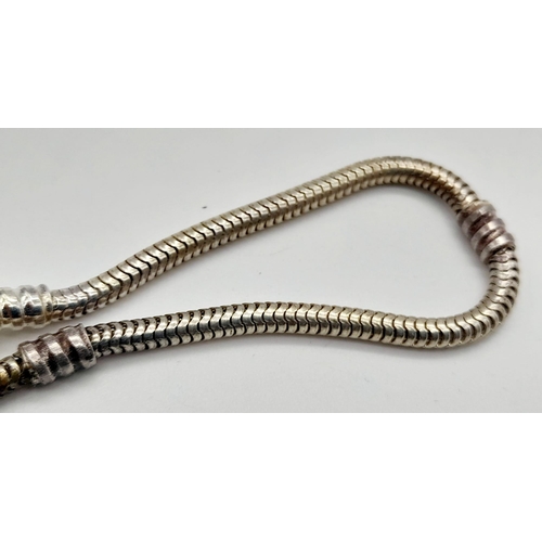 1271 - A sterling silver, designer style, snake chain bracelet. Length: 19 cm , weight: 8.8 g.