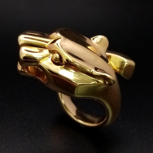 103 - A statement 18 K yellow gold ring in the shape of a Panther twisted round the finger. Size: M, weigh... 