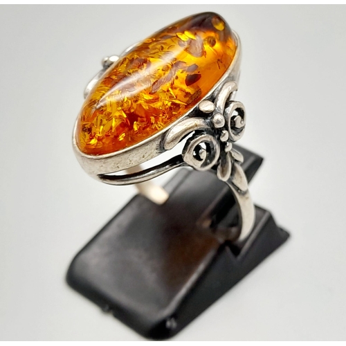 1056 - A Very Good Condition Vintage Sterling Silver and Amber Cabochon Ring Size Q. 2.2cm Length Boat Shap... 