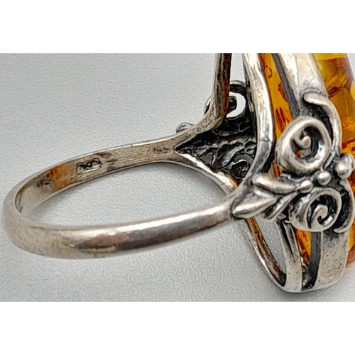 1056 - A Very Good Condition Vintage Sterling Silver and Amber Cabochon Ring Size Q. 2.2cm Length Boat Shap... 