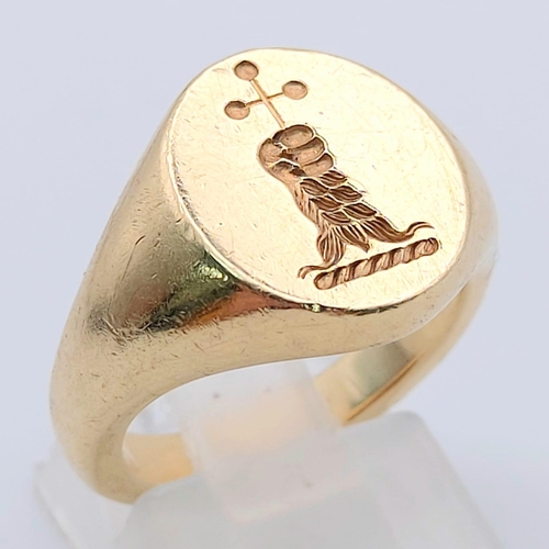 110 - 9K YELLOW GOLD SEAL ENGRAVED SIGNET RING. 10.3G SIZE L