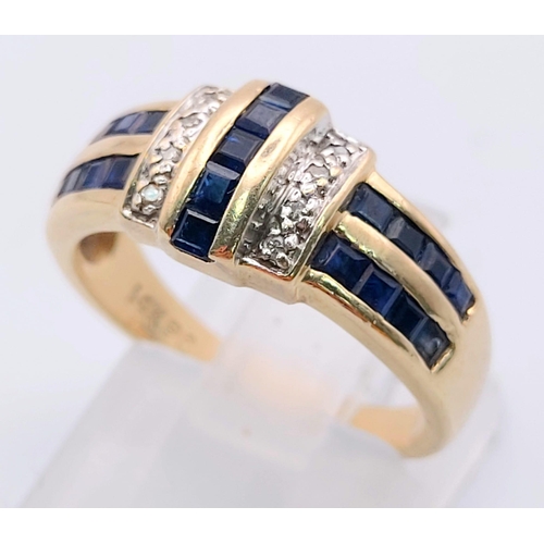 265 - An 18 K yellow gold ring with blue sapphires and diamonds. Ring size: m, weight: 3.7 g.