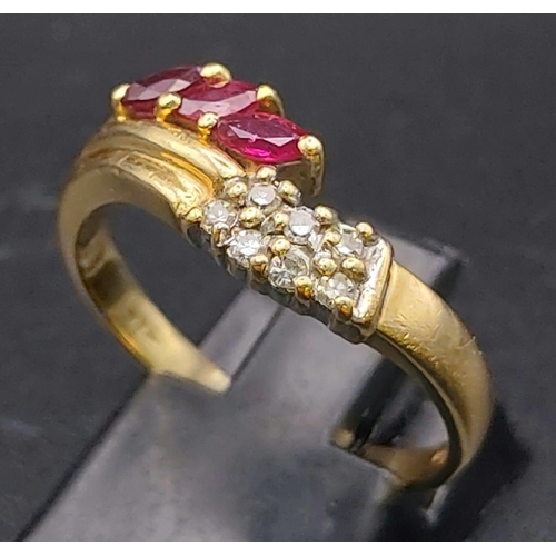 510 - 9K YELLOW GOLD DIAMOND & RUBY RING. TOTAL WEIGHT  3.17G. SIZE R