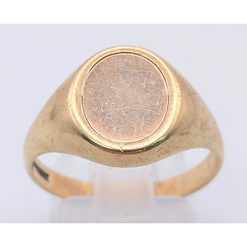 517 - 9K YELLOW GOLD MASONIC SWIVEL SIGNET RING, PLAIN ON ONE SIDE. TOTAL WEIGHT 4.8G SIZE S