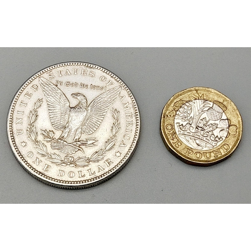 571 - An 1898 Morgan Silver Dollar Philadelphia Mint. Very fine to extremely fine condition, 26.82g.