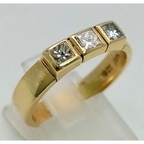 76 - 18K YELLOW GOLD 3 STONE DIAMOND RING. 0.60CT PRINCESS CUTDIAMOND. TOTAL WEIGHT 6.35G. SIZE R