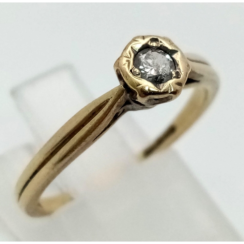 788 - 9k yellow gold illusion set diamond ring. Total Weight 1.7g.  0.15ct Diamond, size M.