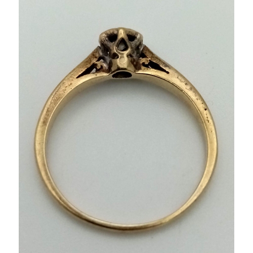 788 - 9k yellow gold illusion set diamond ring. Total Weight 1.7g.  0.15ct Diamond, size M.