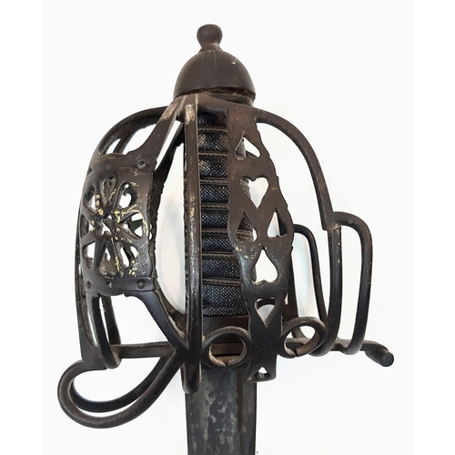 249 - An Antique (18th century) Scottish Basket Hilted Claymore Sword. The basket has a combination of dec... 