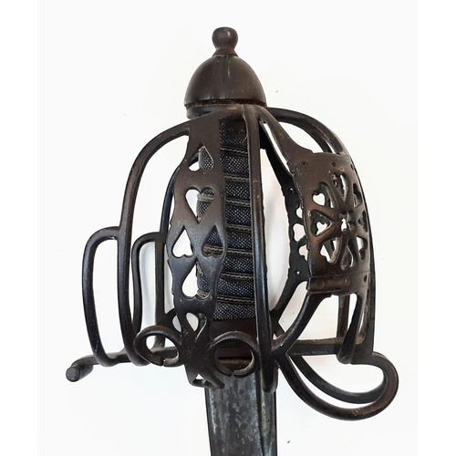 249 - An Antique (18th century) Scottish Basket Hilted Claymore Sword. The basket has a combination of dec... 