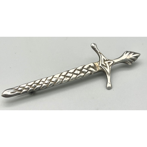 592 - A Vintage Edinburgh Hallmarked 1922 Silver Celtic Sword Brooch 7cm Length-weight 7.76 grams.