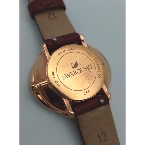 643 - SWAROVSKI CRYSTAL FLOWER, LEATHER STRAP WATCH REFERENCE 5552780. ORIGINAL STRAP FULL WORKING ORDER, ... 