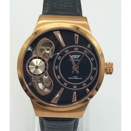 942 - Ex Display Mens Gold Tone Exhibition Back Automatic Watch by GT Precision. Part Skeleton Dial, Black... 