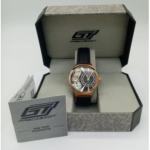 942 - Ex Display Mens Gold Tone Exhibition Back Automatic Watch by GT Precision. Part Skeleton Dial, Black... 