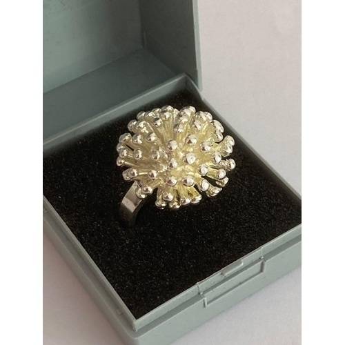 307 - SILVER EXPLOSION RING Complete with jewellers ring box. Size O.