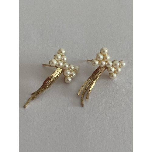 406 - Pair of 9 carat GOLD and seed pearl bow tie earrings. Complete with 9 carat gold backs. 0.66 grams.