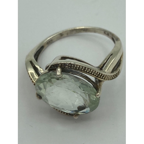 560 - Magnificent 5 carat GREEN AMETHYST set in a SILVER RING. Having a large beautifully faceted pale gre... 