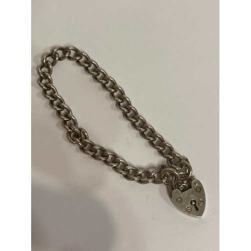 658 - Vintage SILVER LINK BRACELET with Heart Padlock and Silver safety chain. Full hallmark for Henry Gri... 