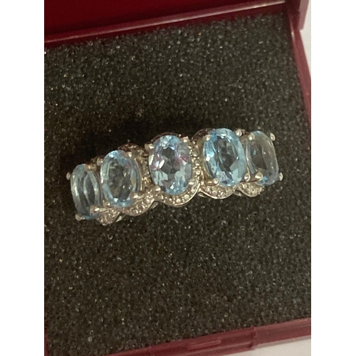 665 - Stunning BLUE TOPAZ RING, Having five beautifully oval cut TOPAZ set to top and mounted in a Platinu... 