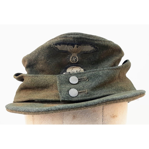 12 - 3rd Reich Waffen SS M43 Ski Cap. Period related small tear on the top. Overall good condition for it... 