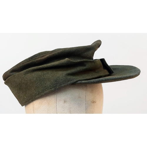 12 - 3rd Reich Waffen SS M43 Ski Cap. Period related small tear on the top. Overall good condition for it... 