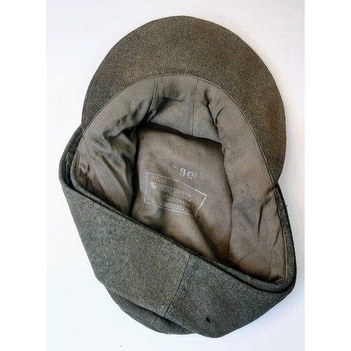 12 - 3rd Reich Waffen SS M43 Ski Cap. Period related small tear on the top. Overall good condition for it... 