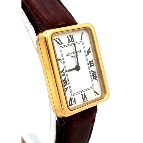 199 - An 18 K yellow gold PATERK PHILIPPE Geneve watch. Case: 25 x 22 mm, white dial with Roman numerals, ... 