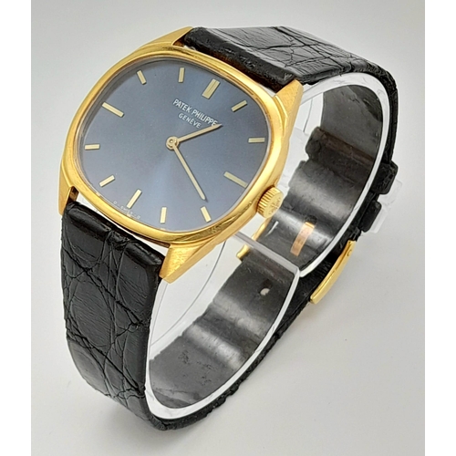 206 - An 18 K yellow gold PATEK PHILIPPE Geneve watch. Case 32 x 28 mm, Blue dial with yellow gold hands a... 