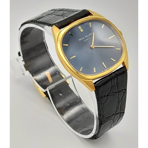 206 - An 18 K yellow gold PATEK PHILIPPE Geneve watch. Case 32 x 28 mm, Blue dial with yellow gold hands a... 