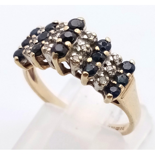 305 - 9K YELLOW GOLD DIAMOND & SAPPHIRE FANCY RING. TOTAL WEIGHT 2.2G SIZE N