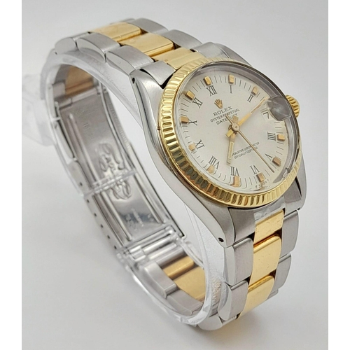 52 - A bimetal ROLEX OYSTER PERPETUAL DATEJUST watch. Stainless steel case 31 mm, 18 K yellow gold calibr... 