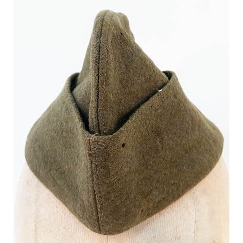 638 - WW2 Italian Officers Side Cap with late post war cap badge.