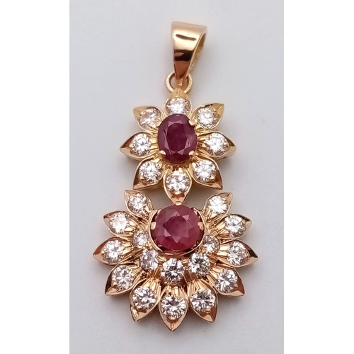 69 - 18K YELLOW GOLD DIAMOND & RUBY DROP PENDANT 1CT APPROX DIAMONDS 0.70CT APPROX RUBIES. TOTAL WEIGHT  ... 