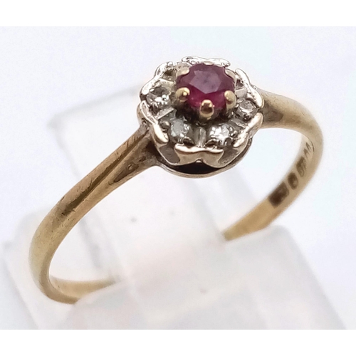 798 - 9K YELLOW GOLD DIAMOND & RUBY CLUSTER RING. TOTAL WEIGHT 1.2G SIZE L